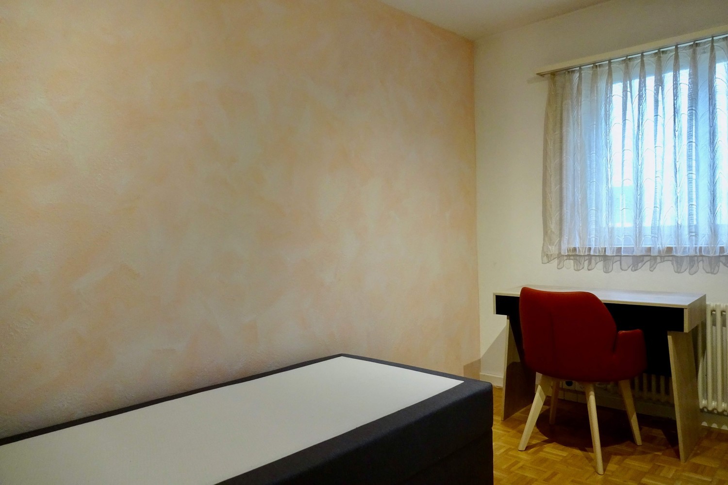 Camera in un appartamento condiviso