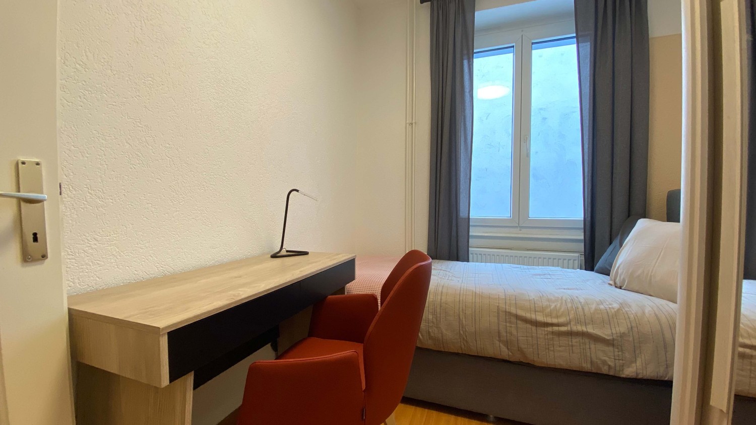 Camera in un appartamento condiviso