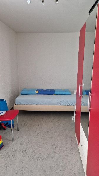 Stanza in un appartamento condiviso